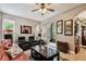Relaxing Gathering room featuring comfortable seating and a view to the back patio at 561 Sienna Dr, Poinciana, FL 34759