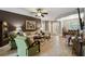 Open concept living room with access to dining area and kitchen at 561 Sienna Dr, Poinciana, FL 34759