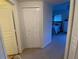 Bright hallway with access to bedrooms and closets at 660 Celebration Ave # 260, Kissimmee, FL 34747