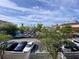 View of a parking lot with numerous cars parked at 660 Celebration Ave # 260, Kissimmee, FL 34747