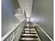 Interior view of a staircase leading to upper levels at 660 Celebration Ave # 260, Kissimmee, FL 34747