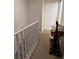 Stairwell leading to upper level with carpet flooring at 660 Celebration Ave # 260, Kissimmee, FL 34747
