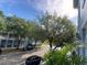 Residential street view with lush landscaping at 660 Celebration Ave # 260, Kissimmee, FL 34747