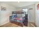 Bedroom with a bunk bed, ideal for children at 709 Benoi Dr, Davenport, FL 33896