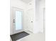 Bright entryway with white door, coat closet and flooring at 759 Largo Pass, Kissimmee, FL 34759
