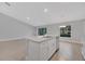 Open kitchen with island, granite counters, and stainless steel appliances at 792 Del Prado Dr, Kissimmee, FL 34758