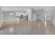 Open living area with tile floors and kitchen access at 792 Del Prado Dr, Kissimmee, FL 34758