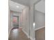 Clean hallway with neutral tile floor and simple design at 792 Del Prado Dr, Kissimmee, FL 34758