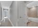 Clean bathroom with tiled walls and a bathtub at 792 Del Prado Dr, Kissimmee, FL 34758