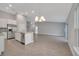 Modern kitchen features stainless steel appliances and granite countertops at 792 Del Prado Dr, Kissimmee, FL 34758