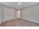 Spacious bedroom with double-door closet and carpet at 792 Del Prado Dr, Kissimmee, FL 34758