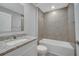 Modern bathroom with granite vanity and tiled shower at 792 Del Prado Dr, Kissimmee, FL 34758