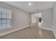 Bright living room with tile floor and view into another room at 792 Del Prado Dr, Kissimmee, FL 34758