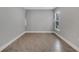 Simple bedroom with grey walls and neutral tile flooring at 792 Del Prado Dr, Kissimmee, FL 34758