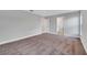 Bedroom with carpet and access to bathroom at 792 Del Prado Dr, Kissimmee, FL 34758