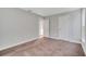Spacious bedroom with neutral walls and carpet at 792 Del Prado Dr, Kissimmee, FL 34758