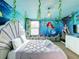 The Little Mermaid themed bedroom with a unique shell bed at 9158 Wedge Dr, Davenport, FL 33896