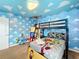 Toy Story themed bedroom with bunk beds and custom decor at 9158 Wedge Dr, Davenport, FL 33896
