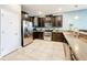 Well-equipped kitchen with stainless steel appliances and granite countertops at 9158 Wedge Dr, Davenport, FL 33896