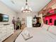King-size bed in a train-themed bedroom with mural at 9158 Wedge Dr, Davenport, FL 33896