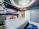 Star Wars themed bedroom with spaceship bed and mural at 9158 Wedge Dr, Davenport, FL 33896