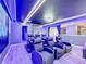 Enjoy movie nights in this themed home theater with luxury seating at 9158 Wedge Dr, Davenport, FL 33896
