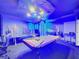 Play pool or ping pong in this themed game room at 9158 Wedge Dr, Davenport, FL 33896