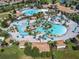 Expansive community pool area with multiple pools and lounging areas at 9158 Wedge Dr, Davenport, FL 33896