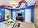 Mario Kart themed bedroom with a custom bed and mural at 9158 Wedge Dr, Davenport, FL 33896
