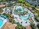 Expansive resort pool with lounge chairs and umbrellas at 9158 Wedge Dr, Davenport, FL 33896