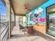 Patio features a dining area and fun mural at 9158 Wedge Dr, Davenport, FL 33896