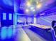 Game room with pool table, ping pong, and fun decor at 9158 Wedge Dr, Davenport, FL 33896