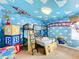 Toy Story themed bedroom with bunk beds and custom decor at 9158 Wedge Dr, Davenport, FL 33896