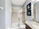 Bathroom features a large shower and granite vanity at 9158 Wedge Dr, Davenport, FL 33896