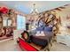 Themed bedroom with train headboard, mural, and ample storage at 9158 Wedge Dr, Davenport, FL 33896