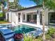 Inviting pool with lounge chairs and patio furniture at 98 E 10Th Ave, Windermere, FL 34786