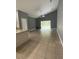 Spacious living room with tile flooring and sliding glass doors to backyard at 1021 Hacienda Cir, Kissimmee, FL 34741