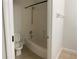 Clean bathroom with a shower/tub combo and tile floor at 1021 Hacienda Cir, Kissimmee, FL 34741