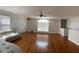Spacious living room with hardwood floors and large window at 1021 Hacienda Cir, Kissimmee, FL 34741