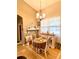 Bright dining room features a charming table setting and decorative accents at 10849 Wyandotte Dr, Clermont, FL 34711