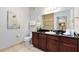 Bathroom with shower, vanity with granite top, and toilet at 1301 Tuscan Ter # 9106, Davenport, FL 33896