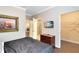 Bedroom with queen bed, ensuite bathroom, and walk-in closet at 1301 Tuscan Ter # 9106, Davenport, FL 33896