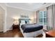 Bedroom with queen-size bed and ample closet space at 1301 Tuscan Ter # 9106, Davenport, FL 33896
