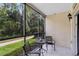 Enjoy your morning coffee on this screened patio with lush views at 1301 Tuscan Ter # 9106, Davenport, FL 33896