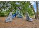 Community playground with climbing structures and slides at 1769 Carnelian St, Deland, FL 32720
