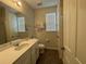 Bathroom with a Mickey Mouse theme and a shower/tub combo at 1799 Caribbean View Ter, Kissimmee, FL 34747