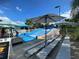 FlowRider surf simulator with seating area at 1799 Caribbean View Ter, Kissimmee, FL 34747