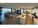Open floor plan with kitchen, living room and pool access at 1799 Caribbean View Ter, Kissimmee, FL 34747