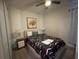 Bedroom with a queen-size bed and geometric bedding at 1799 Caribbean View Ter, Kissimmee, FL 34747