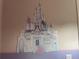 bedroom with a large castle wall decal at 1799 Caribbean View Ter, Kissimmee, FL 34747